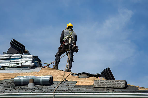 Professional Gutter Installation technician working in Tewksbury, MA